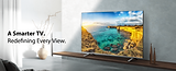 "Smart TV showing coastal view with slogan 'A Smarter TV. Redefining Every View.'"